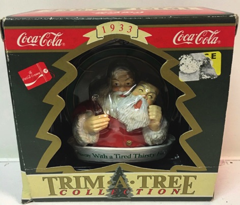 45107-1 € 10,00 coca cola ornament kerstman met masker.jpeg